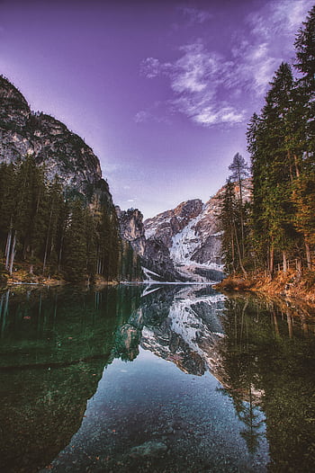 Breathtaking mountain landscape with serene lake reflection during dawn, showcasing nature's tranquility. HD phone wallpaper