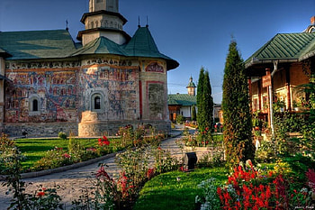Monastery from Bucovina , Romania, buildings, bushes, sky, flowers HD wallpaper