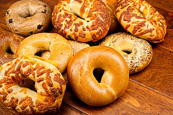 Assorted bagels, Variety of flavors, Tempting choices, Visual delight HD wallpaper
