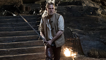 Exciting movie clips, Guy Ritchie's vision, Thrilling action sequences, Sword-wielding protagonist HD wallpaper