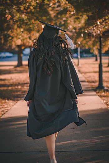 Back view of a graduate walking in an autumn park in academic dress. HD phone wallpaper