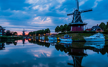 Wooden house and windmills reflected in the river, Evening, Holland, Ships, Netherlands, Sky HD wallpaper