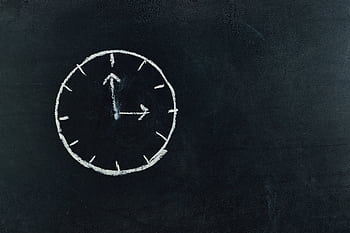 Chalk-drawn clock on a blackboard, symbolizing time and education concepts. HD wallpaper