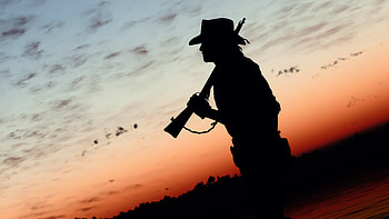 Red Dead Redemption-Inspired Cowboy Silhouette at Sunset, video game, Red Dead Redemption, western, wild west, cowboy HD wallpaper