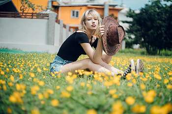 Cowgirl in a Field of Flowers, cowgirl, model, blonde, flowers, hat HD wallpaper