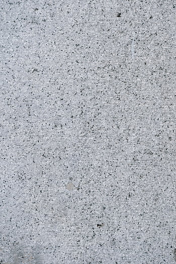 Close-up of a gray speckled granite stone texture perfect for backgrounds. HD phone wallpaper
