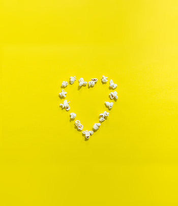 Popcorn, heart shape, yellow background, minimal HD phone wallpaper