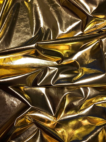 Crinkled gold metallic texture creating a luxurious and vibrant background. HD phone wallpaper