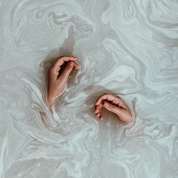Artistic of hands floating in swirling water with calming patterns. HD phone wallpaper
