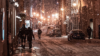 Nighttime snowfall, City street covered in snow, Winter cityscape, Captivating evening view HD wallpaper