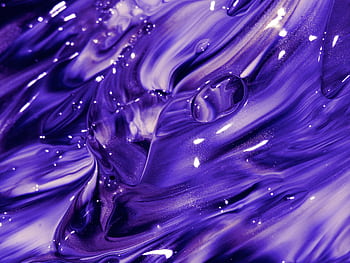 Explore the mesmerizing swirls of vivid purple paint creating a captivating abstract texture. HD wallpaper
