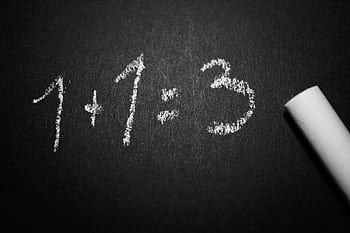 Chalkboard with a humorous incorrect math equation, ideal for educational settings. HD wallpaper