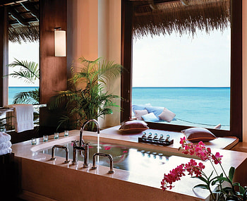 Reethi Rah View out of Bathroom of Grand Villa Water Bungalow Maldives, water bungalow, blue, bathroom, bath, tropical, vista, Maldives, holiday, water, ocean, hot tub, sea, luxury, room, exotic, paradise, jacuzzi, suite, lagoon, retreat, water villa, Reethi Rah, view, stone, spa, peace, feng shui, resort, orchids HD wallpaper