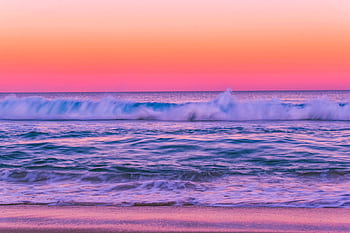 Stunning sunset view with vibrant hues over ocean waves at The Entrance North, NSW, Australia. HD wallpaper