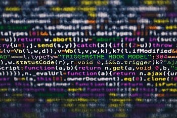Vibrant close-up of multicolor programming code lines displayed on a screen. HD wallpaper
