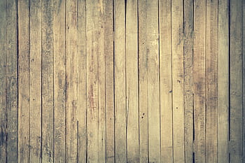 Rustic wooden planks forming a textured background, ideal for design projects. HD wallpaper