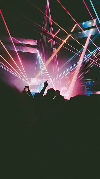 Dynamic concert scene with neon lights and crowd in Antwerpen, Belgium. HD phone wallpaper