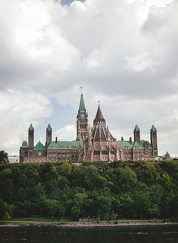 Stunning view of the Gothic Revival Parliament Hill buildings in Ottawa during summer. HD phone wallpaper