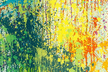 Colorful abstract painting with vibrant splatters creating a dynamic texture and pattern. HD wallpaper