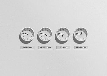 Four wall clocks showing different time zones for London, New York, Tokyo, and Moscow. HD wallpaper