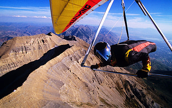 Adventurous aerial sport, Thrilling flying experience, Majestic landscapes, Gliding through the sky HD wallpaper