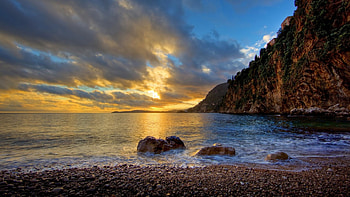 wonderful seashore cliffs at sunset r, sea, shore, cliffs, clouds, r, rocks, sunset HD wallpaper