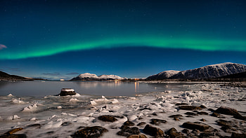 Aurora Borealis Snow Covered Stones Mountains Reflection On Lake Nature HD wallpaper
