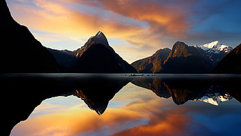Sunset reflections at Milford Sound, Fiordland National Park, South Island HD wallpaper