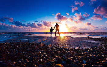 father and son at beach HD wallpaper