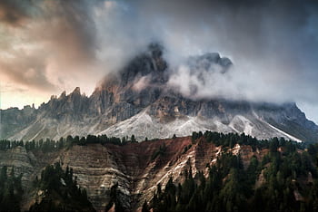 Breathtaking view of foggy Dolomites at dawn, perfect for nature and adventure themes. HD wallpaper