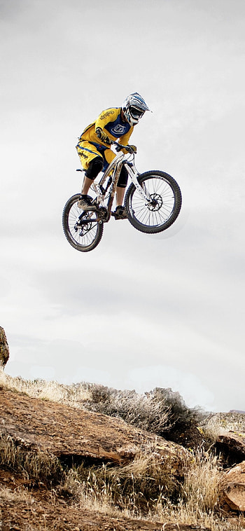 Sports bicycle, Adrenaline rush, Competitive spirit, Thrilling races HD phone wallpaper