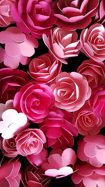 A striking arrangement of pink paper roses, perfect for floral-themed designs and backgrounds. HD phone wallpaper