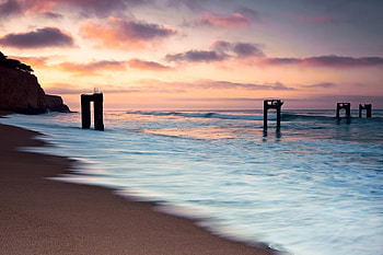 Ocean Waves, sand, colors, peaceful, sunrise, beauty, beach, waves, reflection, seascape, sunset, sea, beautiful, rocks, view, clouds, nature, sky, lovely, splendor HD wallpaper