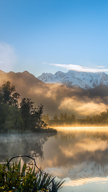 The Golden Sunrise at Lake Matheson, lake, nature, landscape, New Zealand, mountain, fog, sky HD phone wallpaper