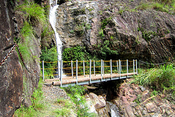 Bridge and a small waterfall, small waterfall, bridge, grass, cliff, mountain path HD wallpaper