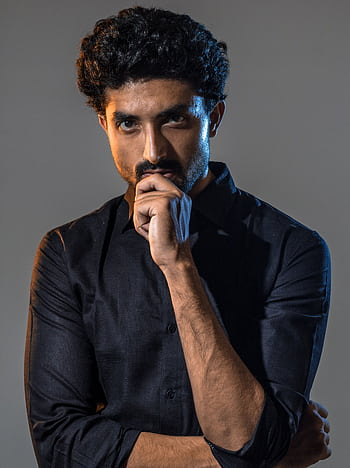 Portrait of a thoughtful man with a serious expression in Jaipur, India. HD phone wallpaper