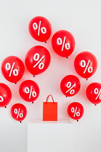 Red balloons with percentage symbols and a shopping bag on white background. HD phone wallpaper