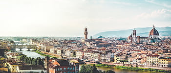Stunning panoramic landscape of Florence, Italy showcasing iconic Il Duomo and city architecture. HD wallpaper