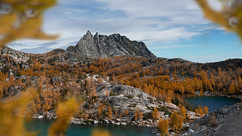 Larch Season in full effect - The Enchantments, Washington, colors, trees, clouds, landscape, sky, mountain, stones, fall, usa, autumn HD wallpaper