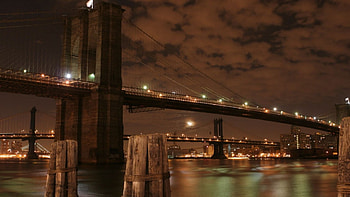 brooklyn bridge under a cloudy night, night, river, city, lights, clouds, bridges HD wallpaper