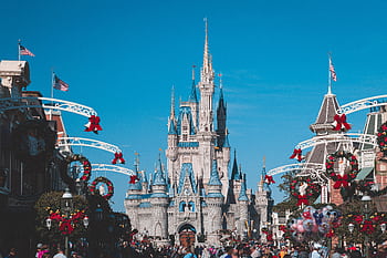 Cinderella Castle at Disney World's Magic Kingdom adorned for holiday festivities, Orlando, Florida. HD wallpaper