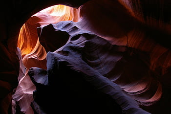 Explore the vibrant, swirling patterns of Antelope Canyon's sandstone formations. HD wallpaper