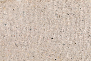 High-resolution beige paper texture with visible fibers, perfect for backgrounds. HD wallpaper