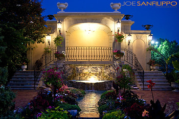 Beautiful fountain, concrete, post, steps, flowers bush, stairs, lights, fountain, greenery, railing, water, pedestal HD wallpaper