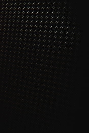 A monochrome textured surface featuring a dark dot pattern, ideal for backgrounds or . HD phone wallpaper
