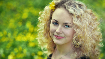 Beauty, model, blonde, yellow, flower, green, face, girl HD wallpaper