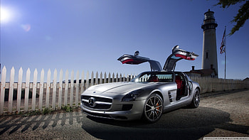 mercedes benz sls amg, wings, lighthouse, car, fence, sun HD wallpaper