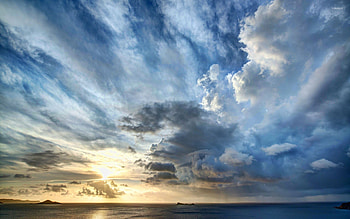 Stormy clouds above the ocean at sunset HD wallpaper