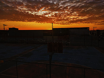 A basketball court with a sunset in the background, sunset, sun, sky, dusk, graphy, landscape HD wallpaper