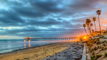 California beach at night, Scenic beauty, Nighttime reflections, Peaceful ambiance HD wallpaper